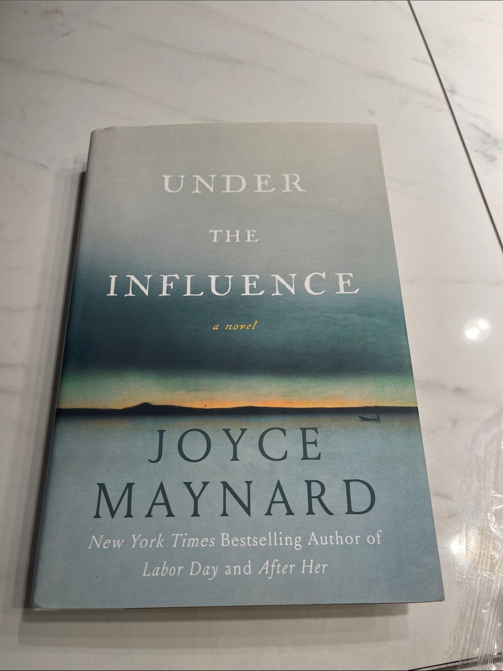 Under the Influence - Blue Gradient Hardcover Novel by Joyce Maynard